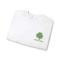 Embroidered green shamrock above bold “Irish True” text in matching green, perfect for St. Patrick’s Day or everyday Irish pride. This embroidered design stands out on a cozy folded white sweater, celebrating Irish heritage.