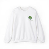 Embroidered green shamrock above bold “Irish True” text in matching green, perfect for St. Patrick’s Day or everyday Irish pride. This embroidered design stands out on a cozy white sweater, celebrating Irish heritage.