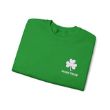 Embroidered white shamrock above bold “Irish True” text in matching white, perfect for St. Patrick’s Day or everyday Irish pride. This embroidered design stands out on a neatly folded Irish green sweater, celebrating Irish heritage.