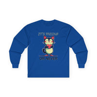 Royal blue long-sleeve Valentine's shirt featuring an adorable cat-themed design. The front showcases a cute black and white cartoon cat with rosy cheeks, holding a red heart and smiling sweetly. Above and below the cat, playful text reads "IT'S MEOW OR NEVER" in a fun, romantic font. This cat lovers' shirt is perfect for Valentine's Day, offering a charming and lighthearted way to celebrate love and affection with a feline twist.