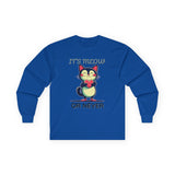 Royal blue long-sleeve Valentine's shirt featuring an adorable cat-themed design. The front showcases a cute black and white cartoon cat with rosy cheeks, holding a red heart and smiling sweetly. Above and below the cat, playful text reads "IT'S MEOW OR NEVER" in a fun, romantic font. This cat lovers' shirt is perfect for Valentine's Day, offering a charming and lighthearted way to celebrate love and affection with a feline twist.