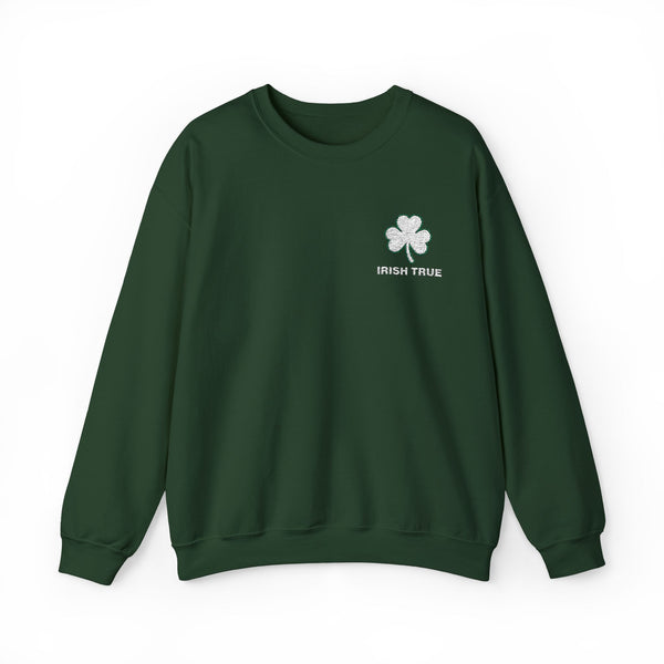 Embroidered white shamrock above bold “Irish True” text in matching white, perfect for St. Patrick’s Day or everyday Irish pride. This embroidered design stands out on a cozy forest green sweater, celebrating Irish heritage.