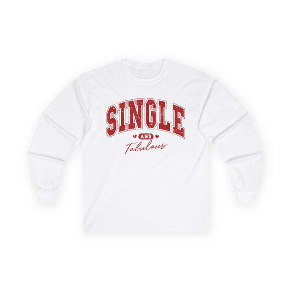 White long-sleeve Valentine's shirt designed for those who embrace their single status with confidence. The front features red, bold, distressed collegiate-style lettering that reads "SINGLE AND Fabulous," with small heart accents adding a playful touch. This Valentine's shirt for singles is perfect for celebrating self-love and independence in a stylish and empowering way.