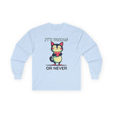 Light blue long-sleeve Valentine's shirt featuring an adorable cat-themed design. The front showcases a cute black and white cartoon cat with rosy cheeks, holding a red heart and smiling sweetly. Above and below the cat, playful text reads "IT'S MEOW OR NEVER" in a fun, romantic font. This cat lovers' shirt is perfect for Valentine's Day, offering a charming and lighthearted way to celebrate love and affection with a feline twist.