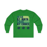 Irish green long-sleeve t-shirt with bold green and navy text reading 'Irish By Birth Craic By Choice' over stripes, celebrating Irish pride and St. Patrick’s Day. Perfect for festive apparel, parades, and parties. Embrace the spirit of craic and Irish heritage!